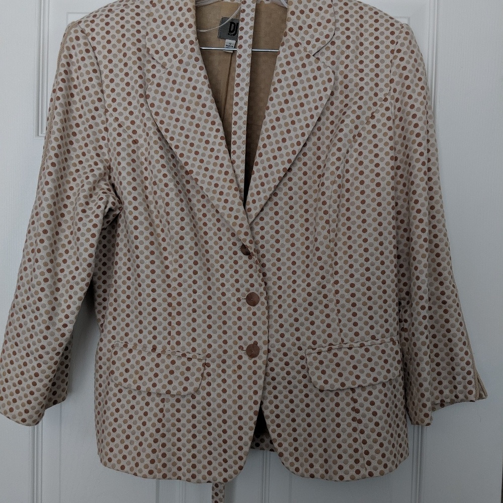 Jacket with self belt